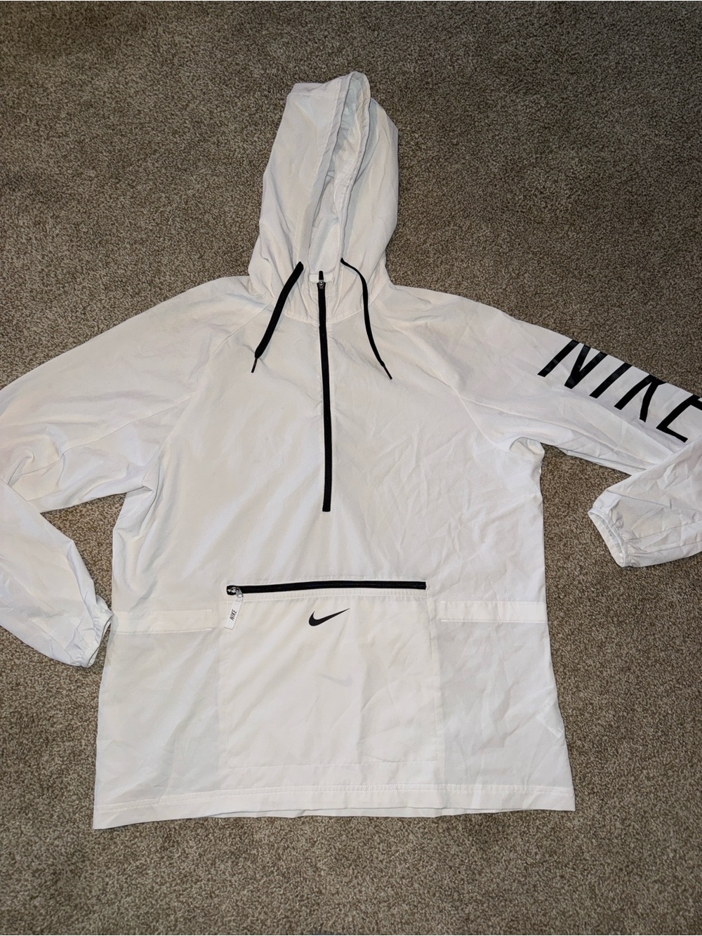 Nike Dri fit 
1/4 zip running jacket. 
Front zip pocket. 
White & black. 
Size L